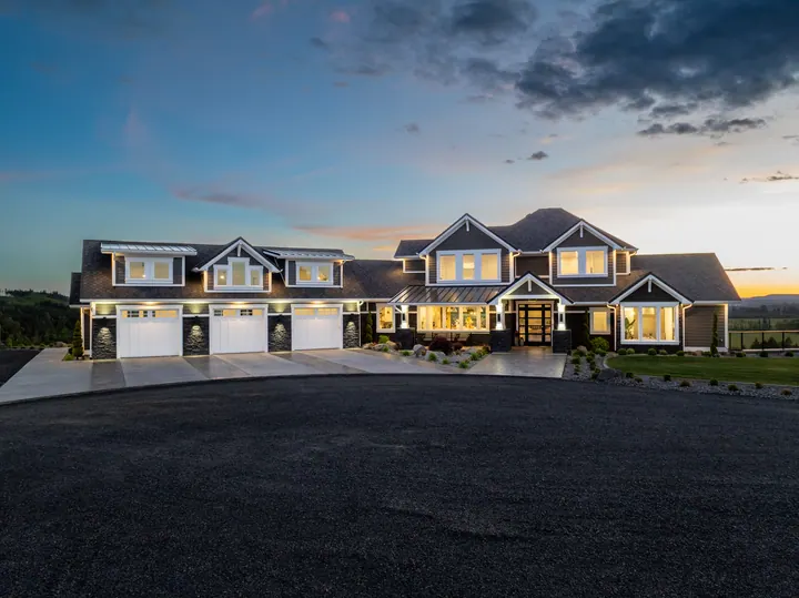Large home photographed in evening light