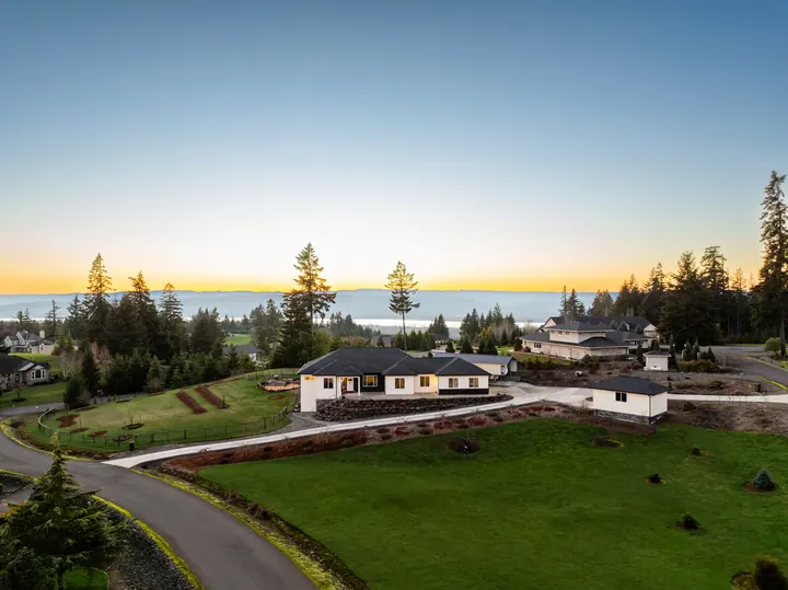 Aerial photograph of a home and its surrounding grounds