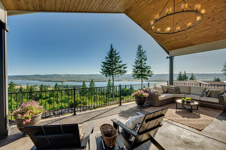 Covered outdoor terrace overlooking a valley