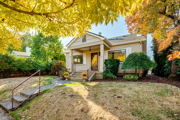 Front porch and garden in autumn light