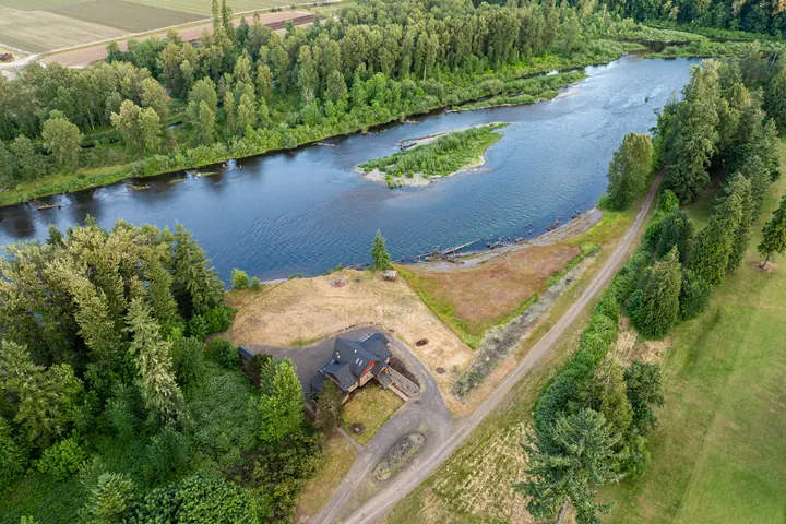 Aerial view of a river bordered by trees