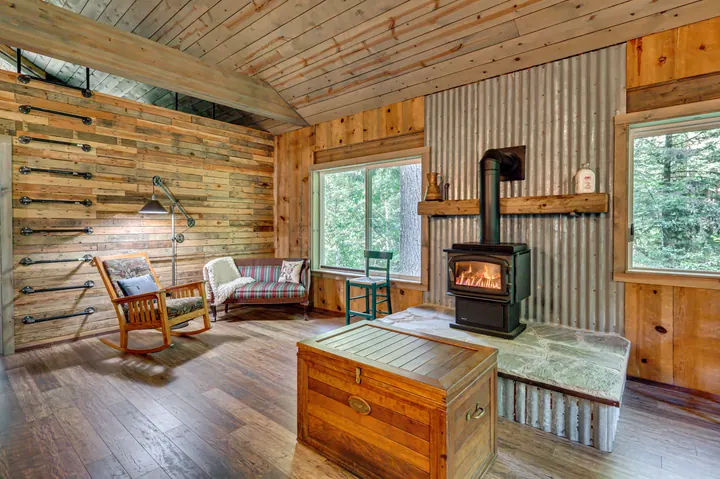 Cabin interior with a wood-burning stove