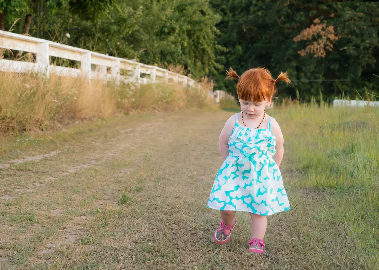 Outdoor child portrait in warm late-day light